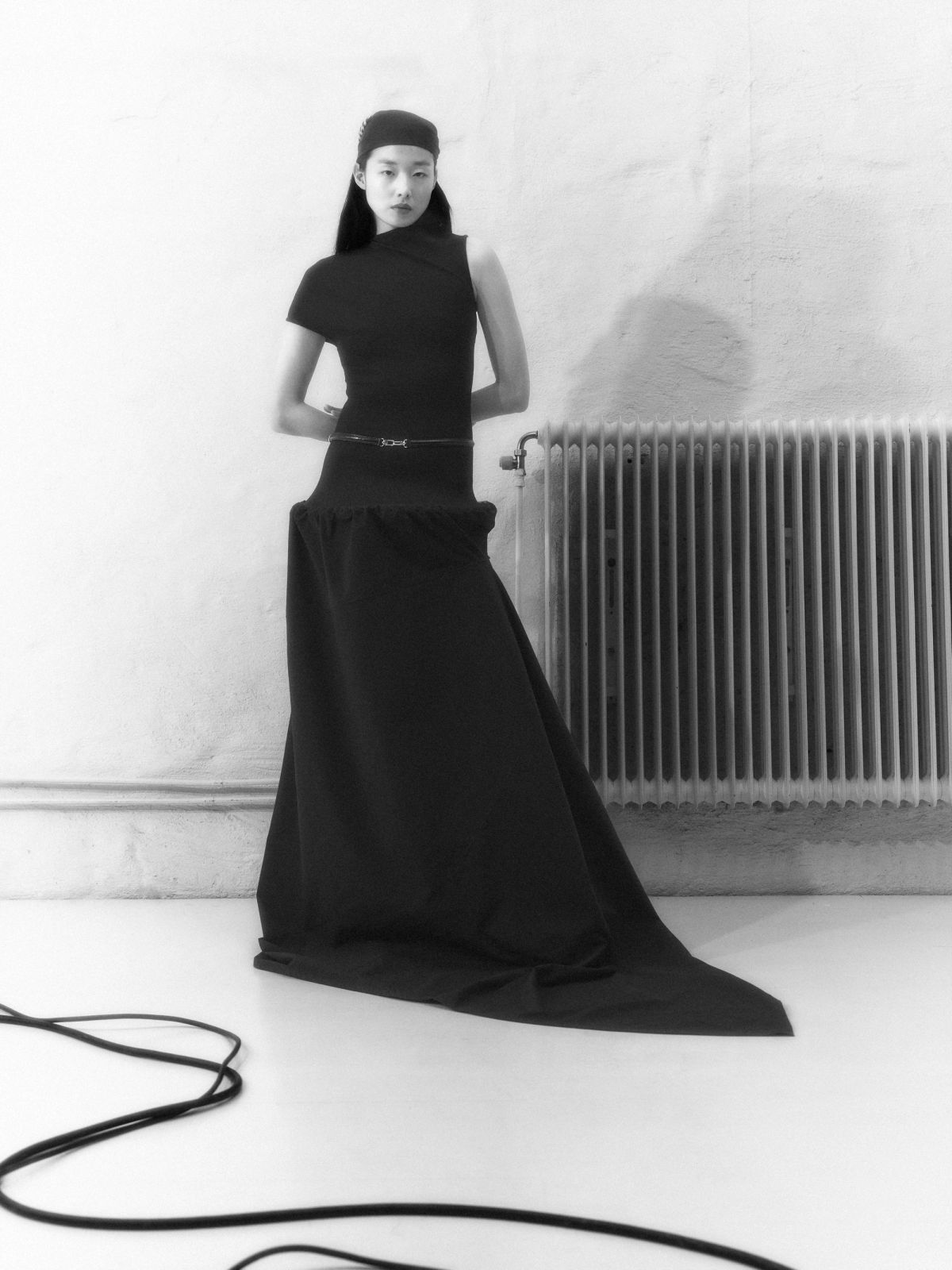 model in full length black dress
