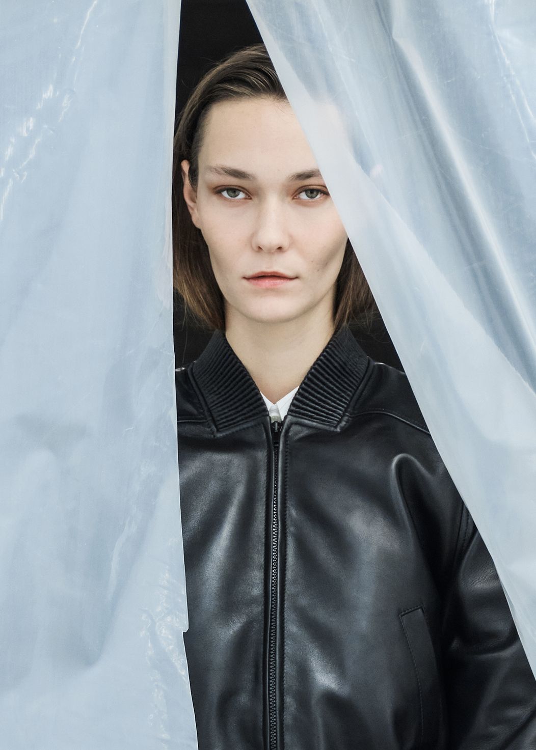 Woman wearing bomber jacket