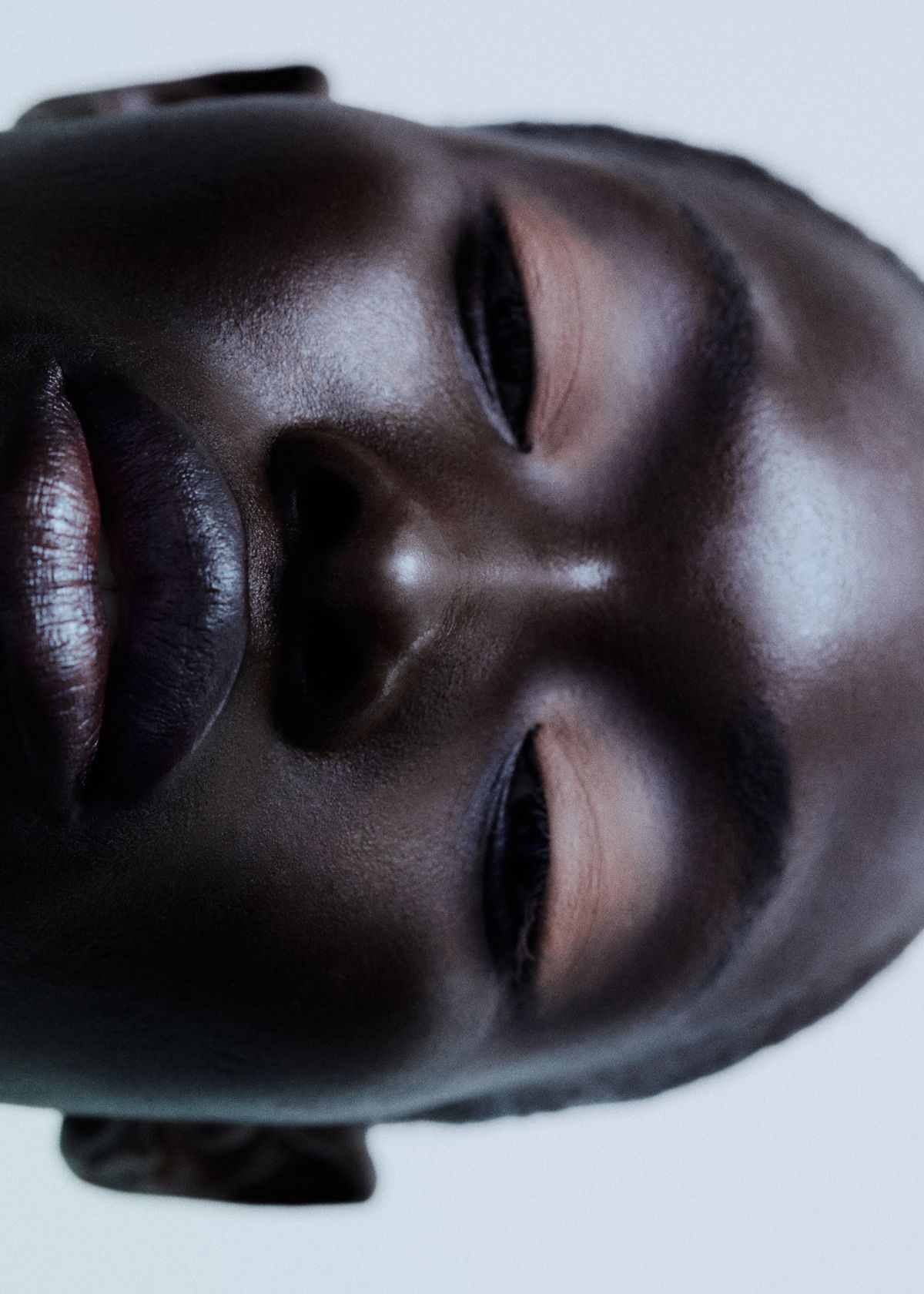 orange brown eyeshadow dark purple lip 