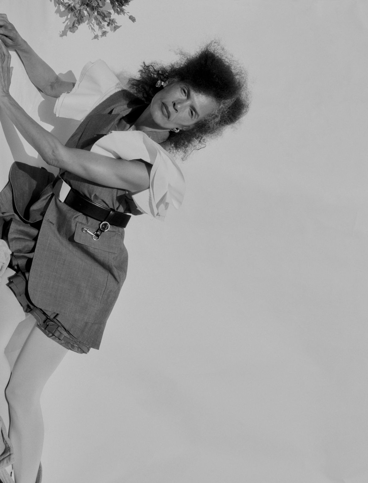 Model laying across a white background