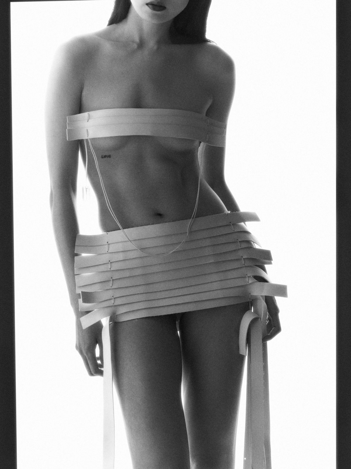 cropped shot of a womens body wearing venetian blinds 1