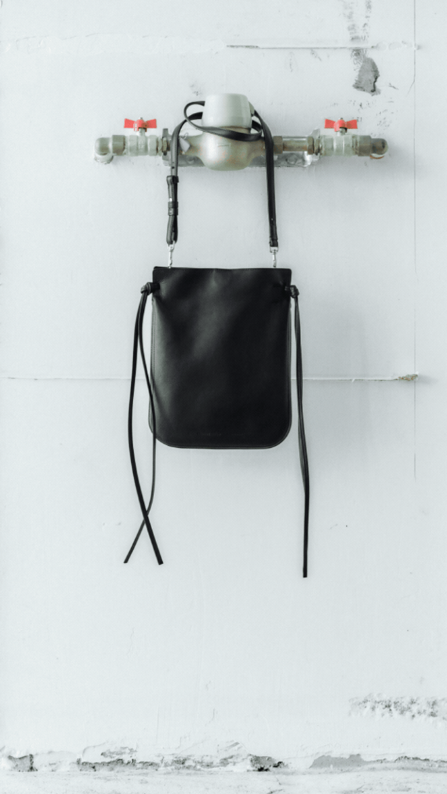 Bags hanging on metal