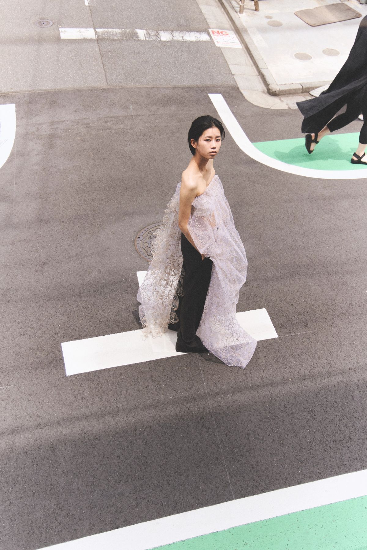 model shot from above stares direct to camera