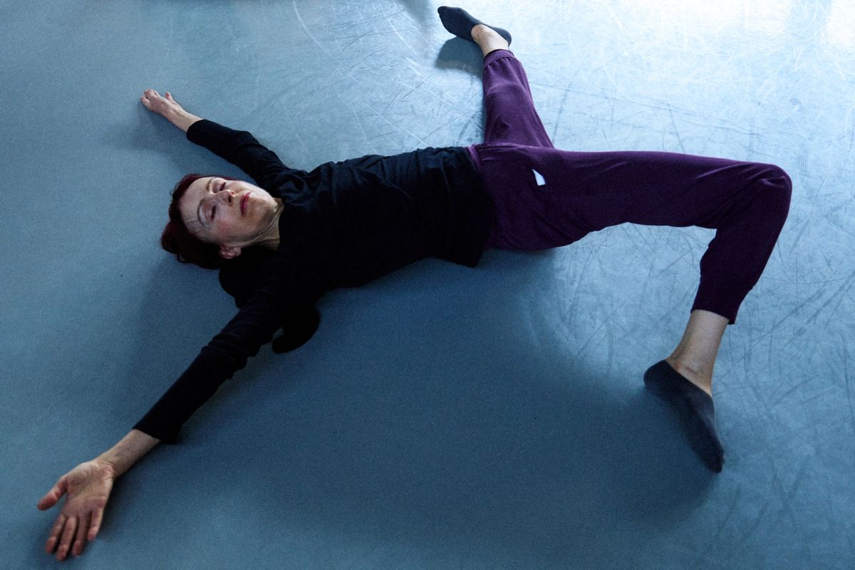 women stretching arms and legs fully stretched