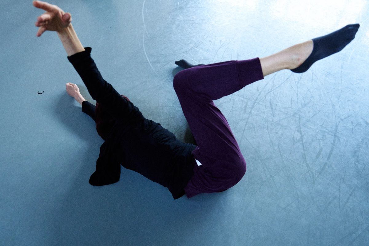 women stretching arms and legs in the air