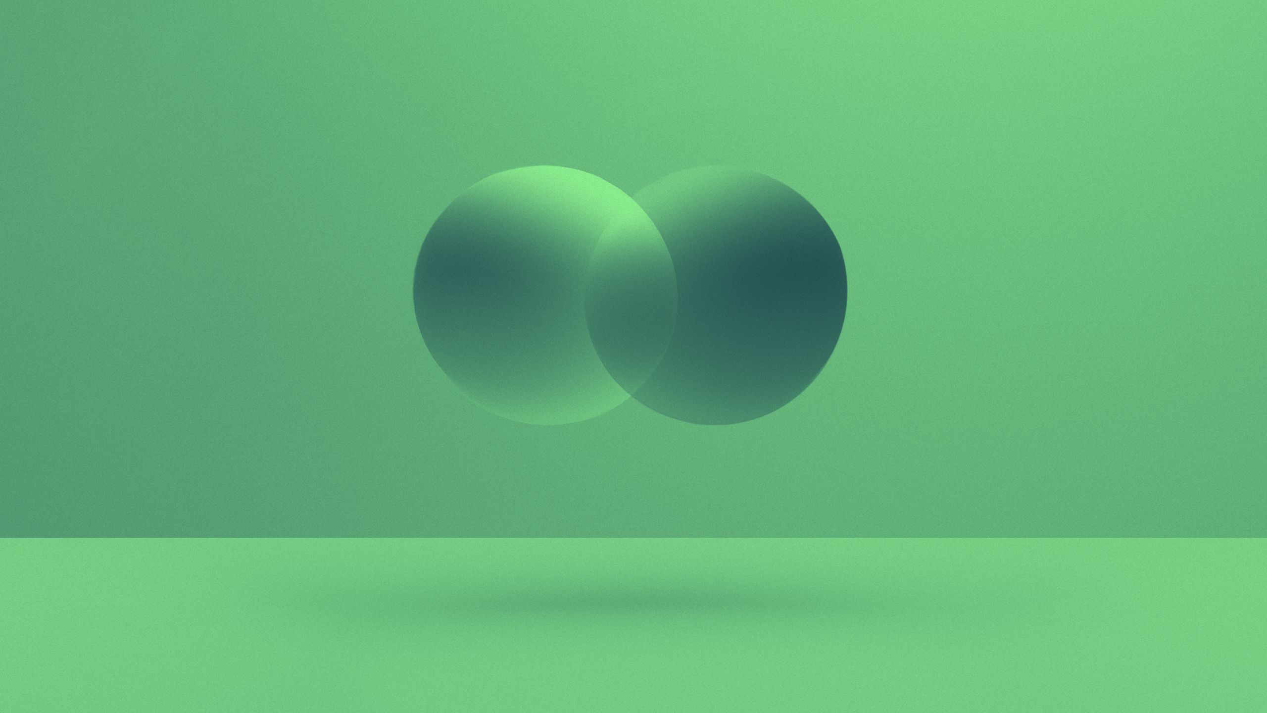 3d render of two spheres overlapping in a green environment