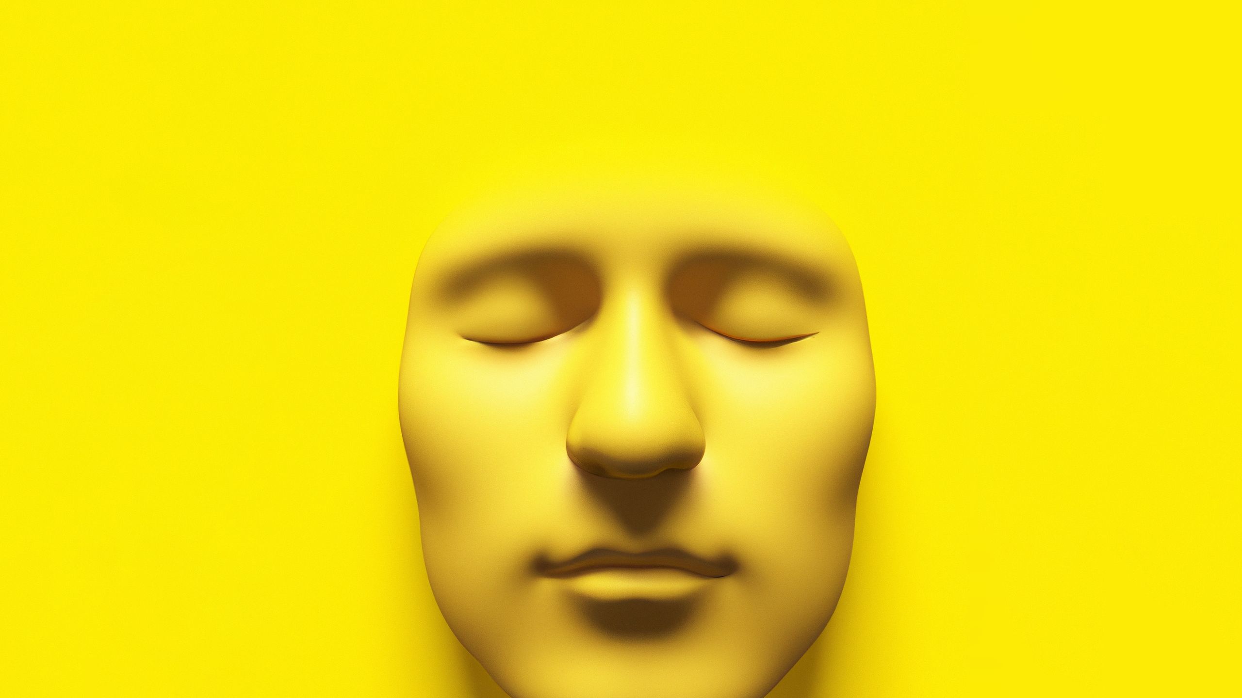 3d render of an simple face with eyes closed in a yellow environment