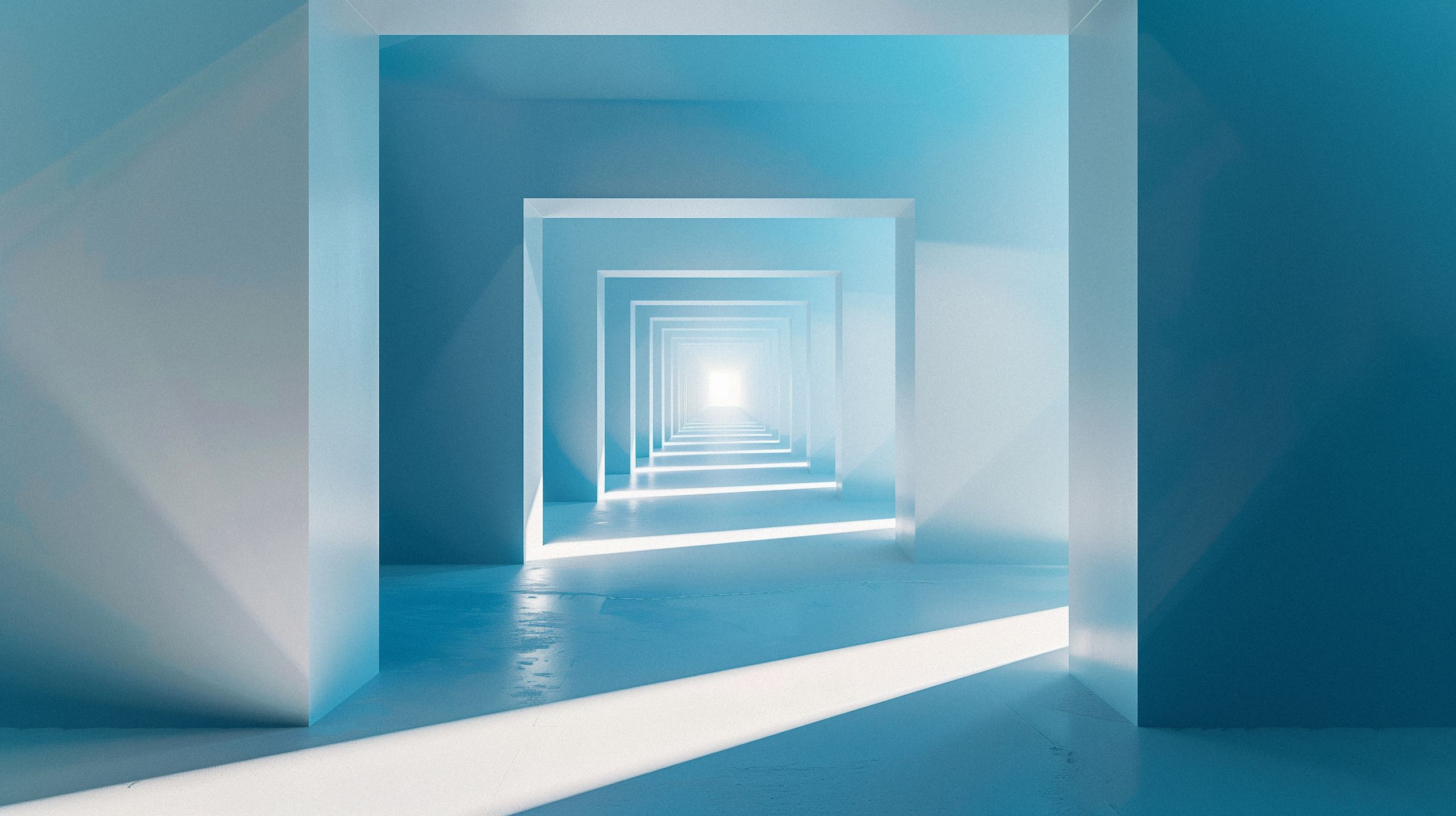 Long corridor with light shinning through on either side