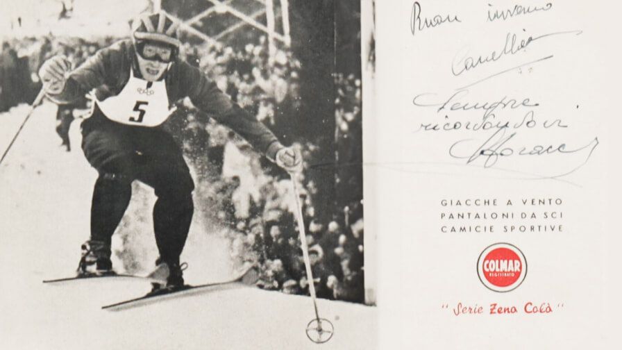 man skiing with autograph and Colmar logo