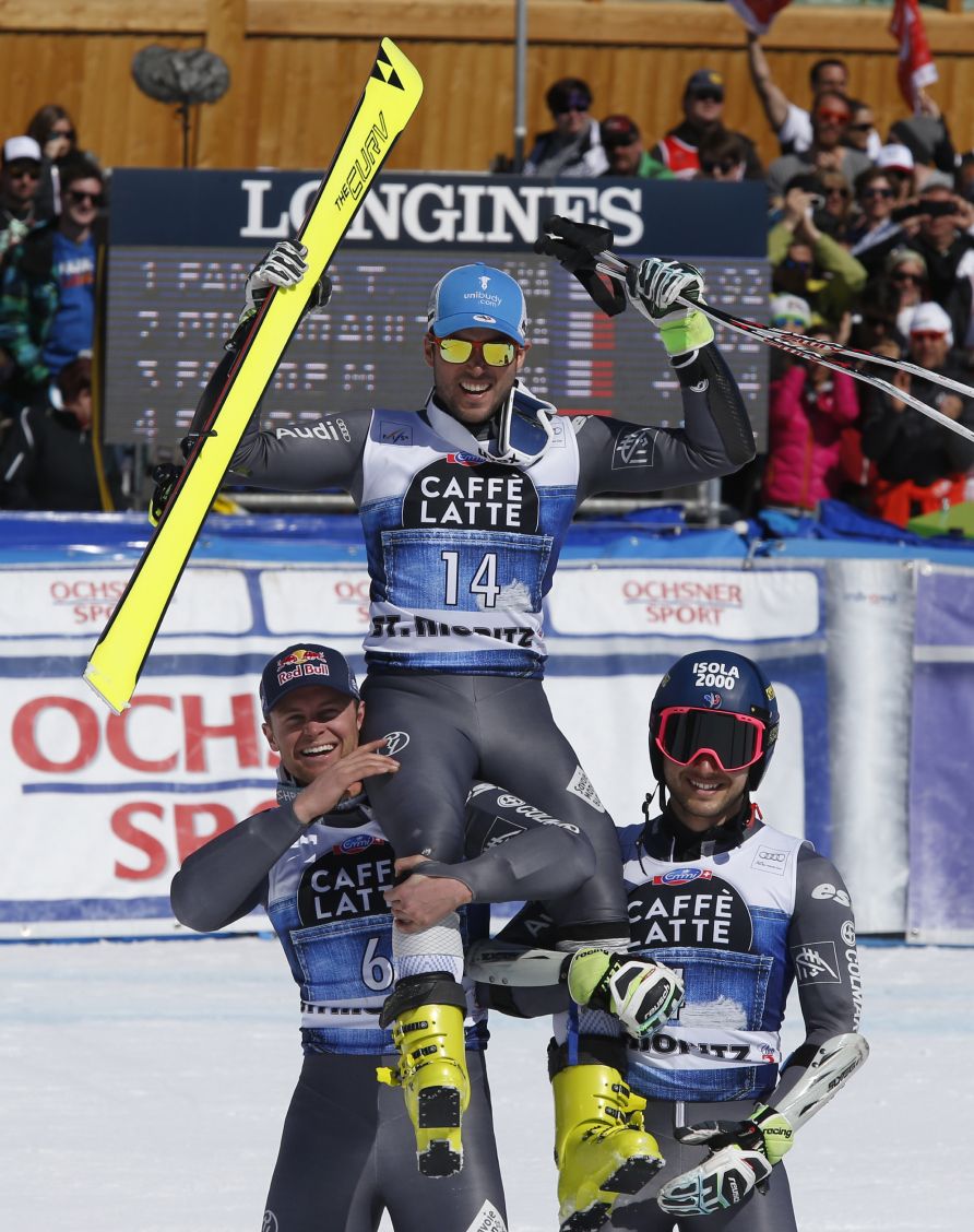 trio of skiers celebrating