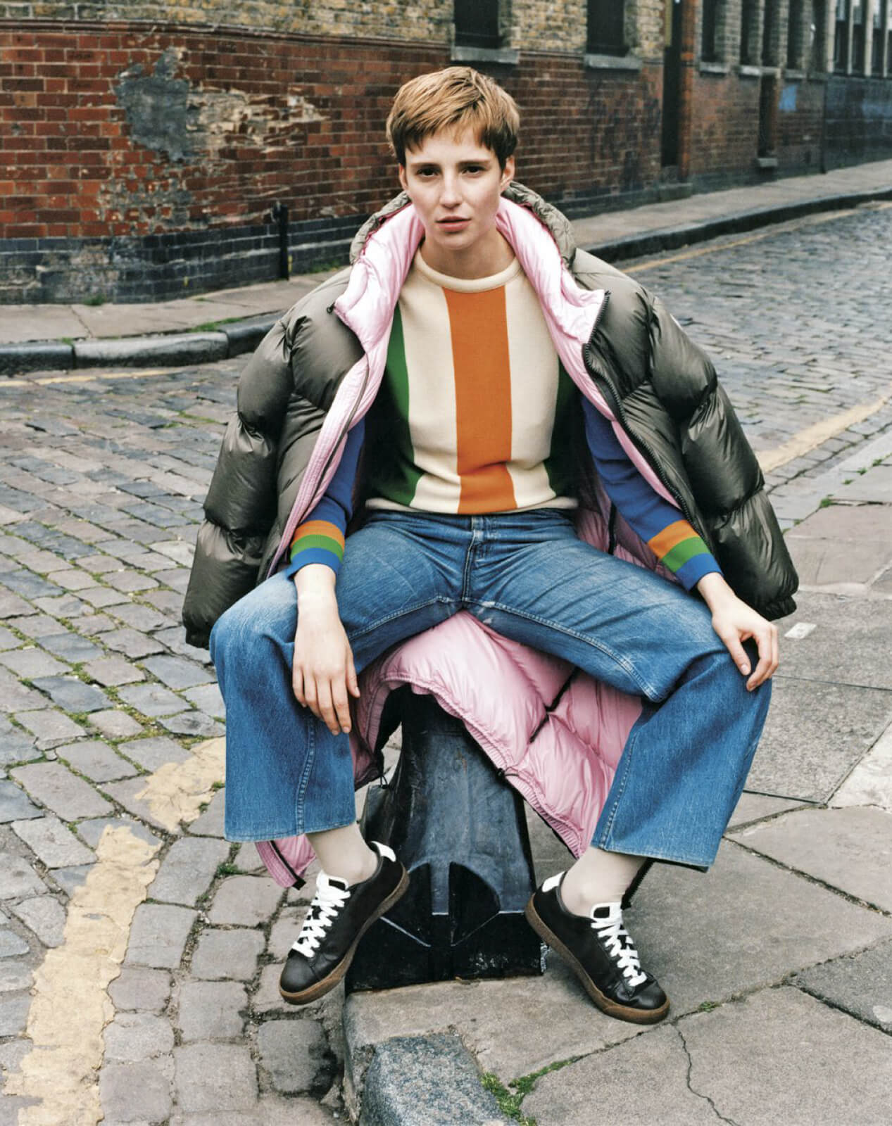 girl sitting in the street