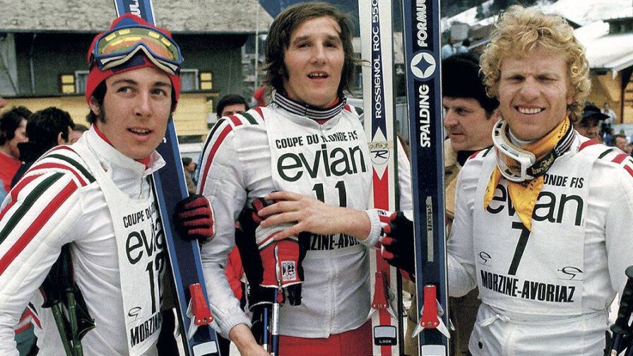 three men in ski suits