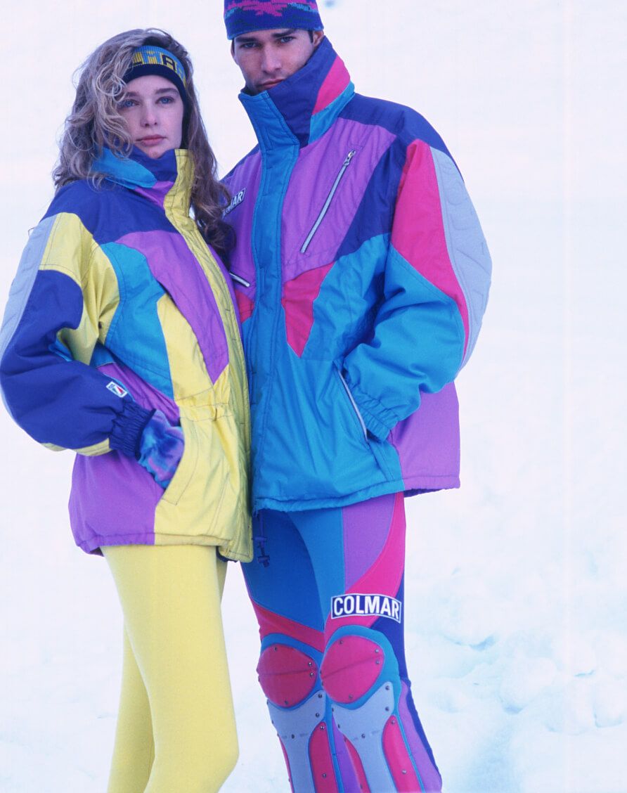 boy and girl dressed in ski clothes
