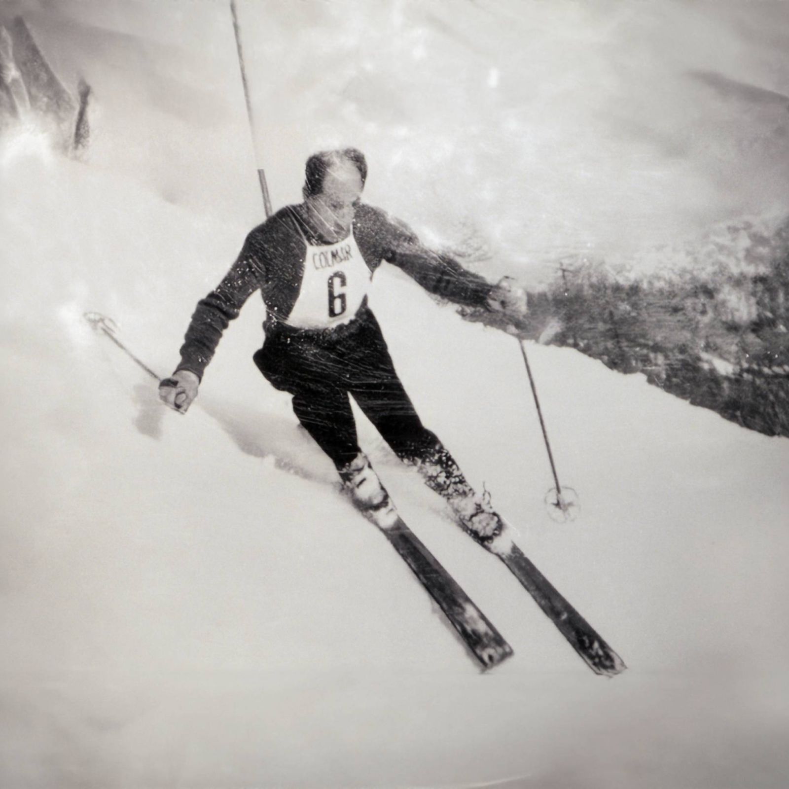 man skiing in black and white