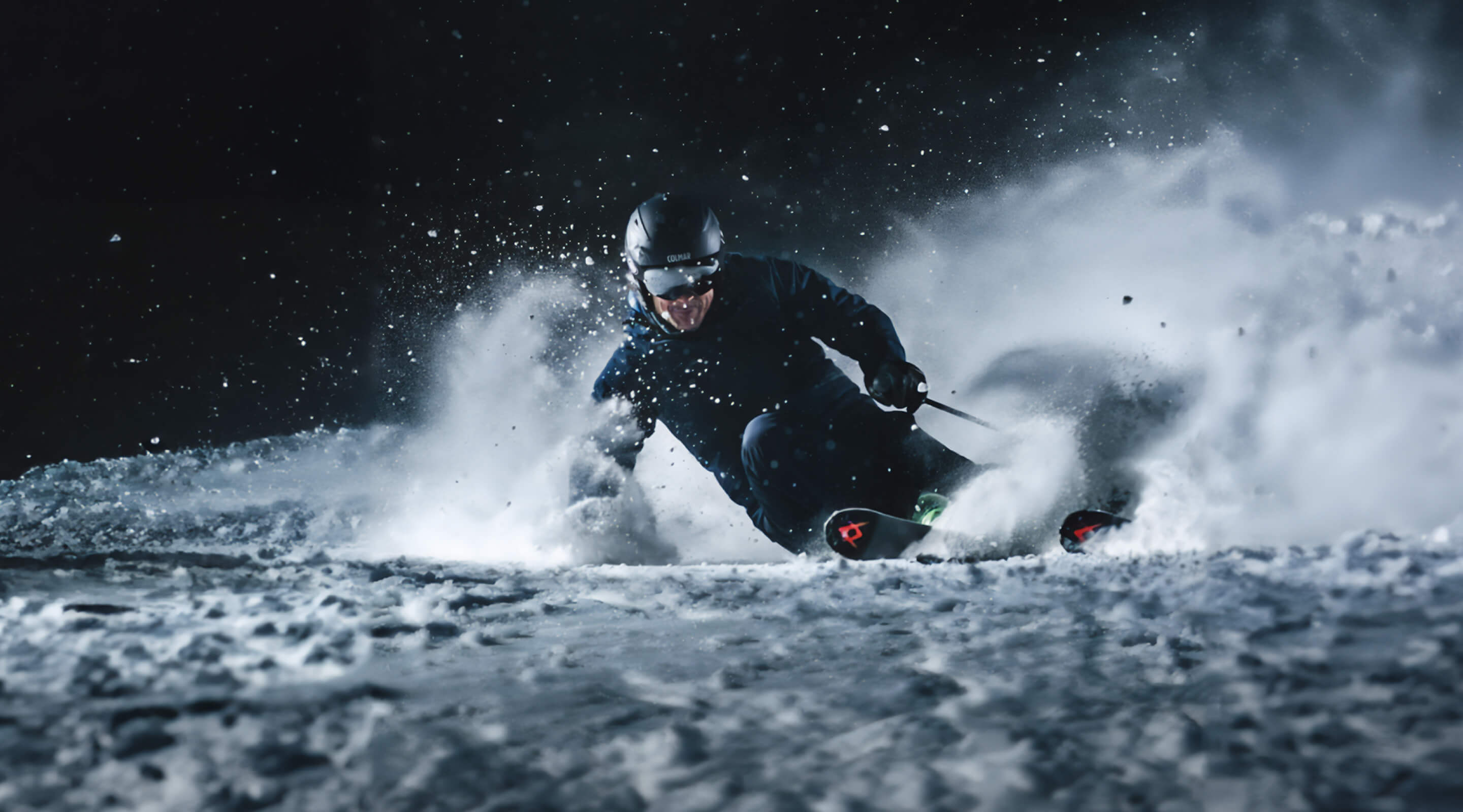 skier in the mountains at night