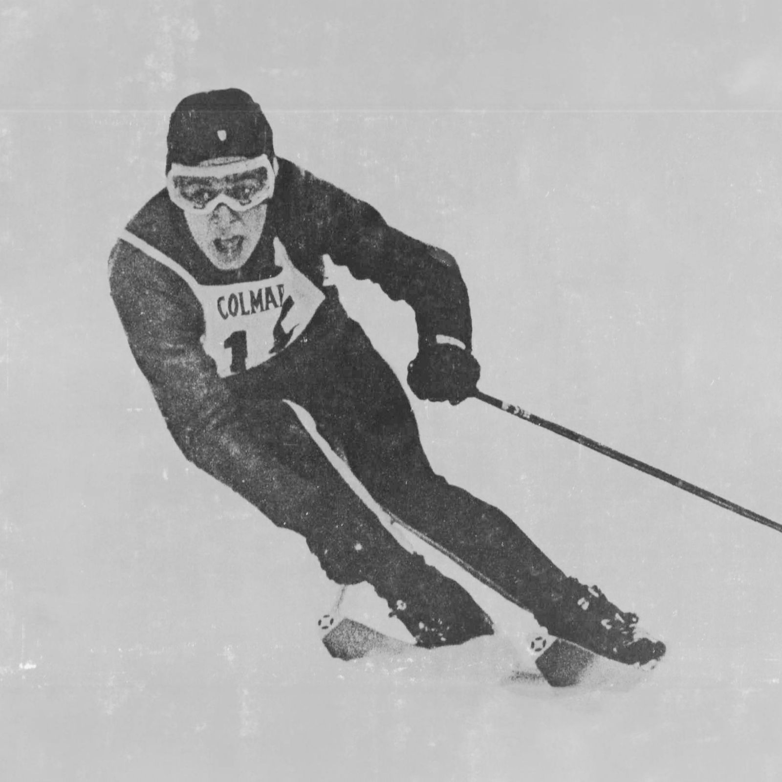 skier with black and white Colmar bib