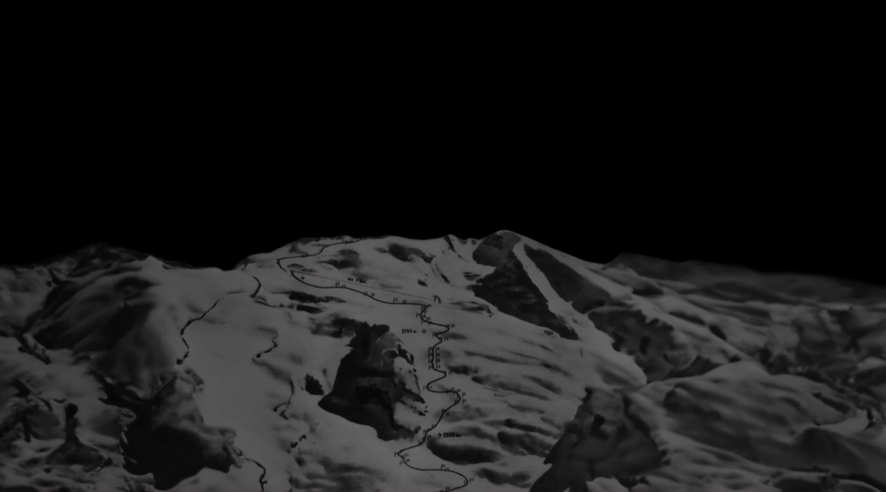 photo of mountains in the dark from above