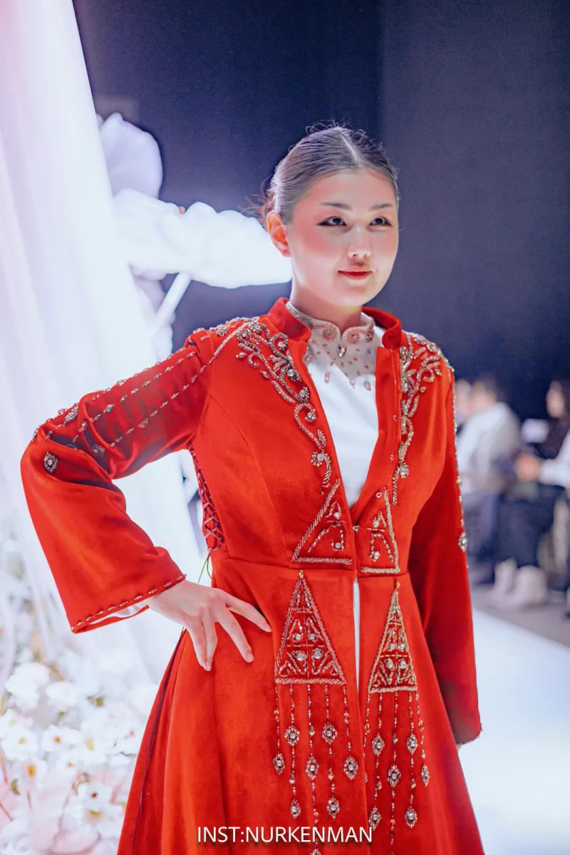 Model in a red embroidered national coat
