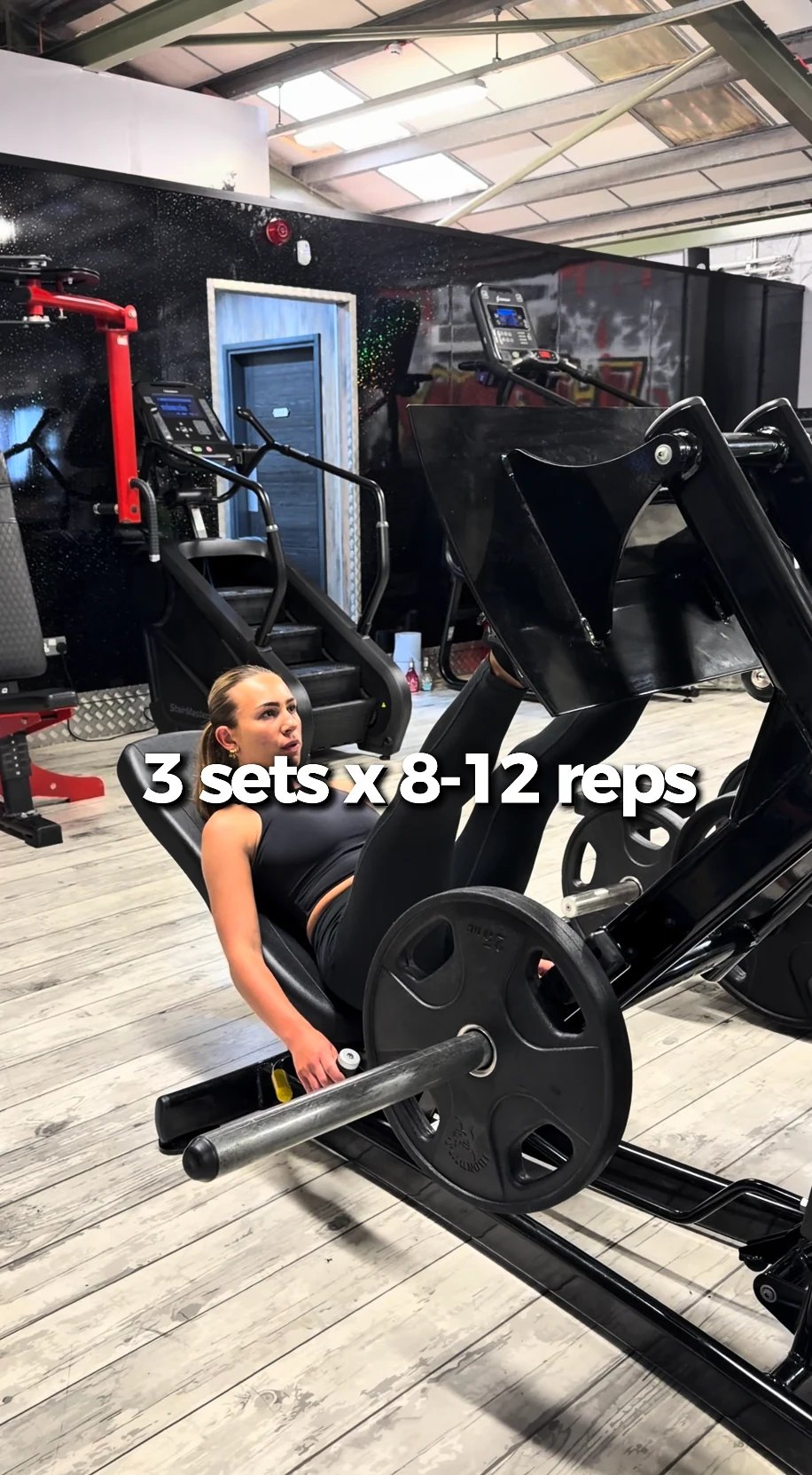 A Worx Gym training-content frame showing a person using a leg machine with an on-screen repetition guide