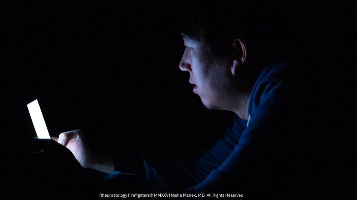 man on phone at night