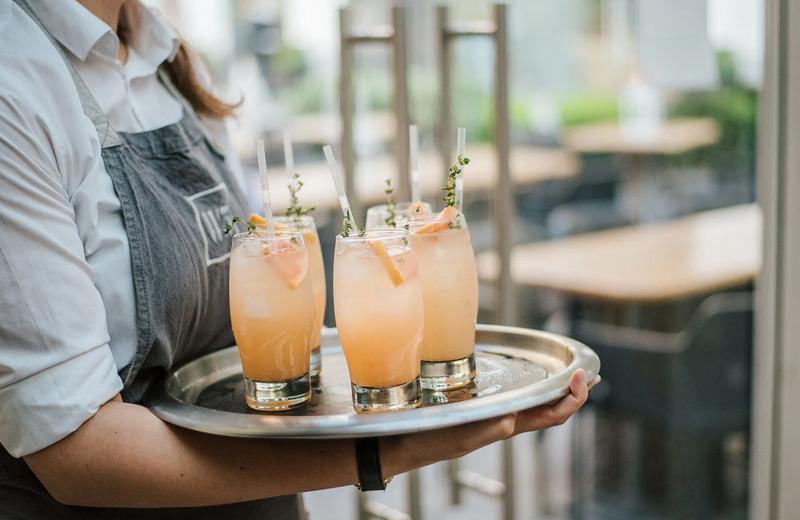 waiter serving cocktail