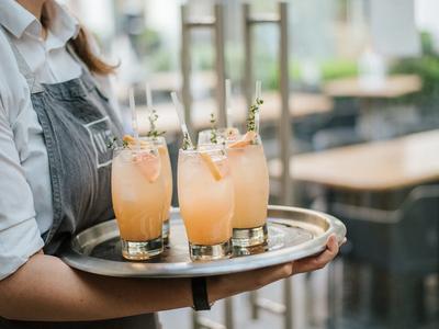 waiter serving cocktail