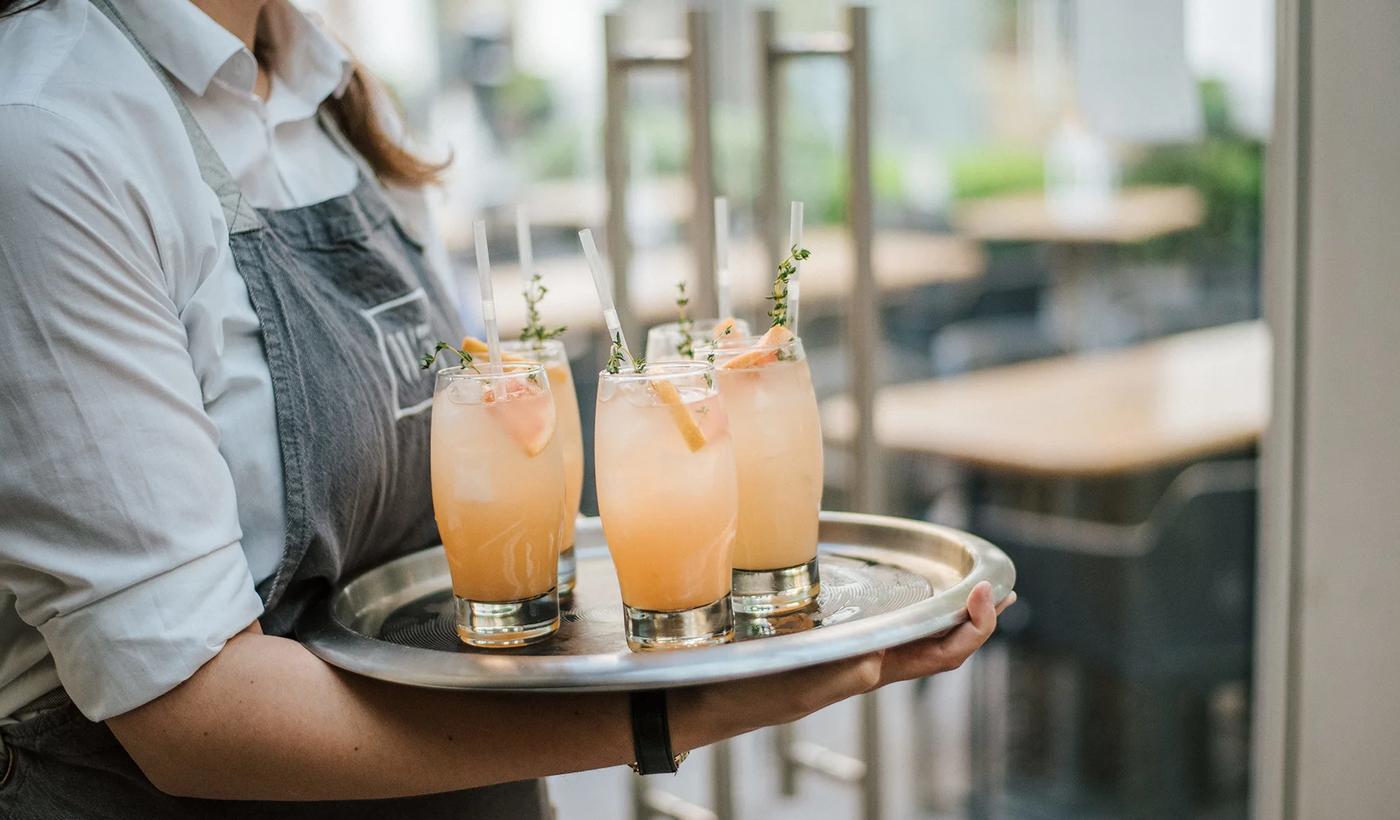 waiter serving cocktail