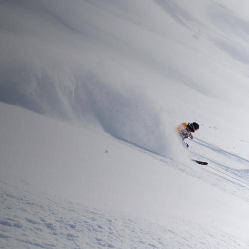 Skier in chest deep snow