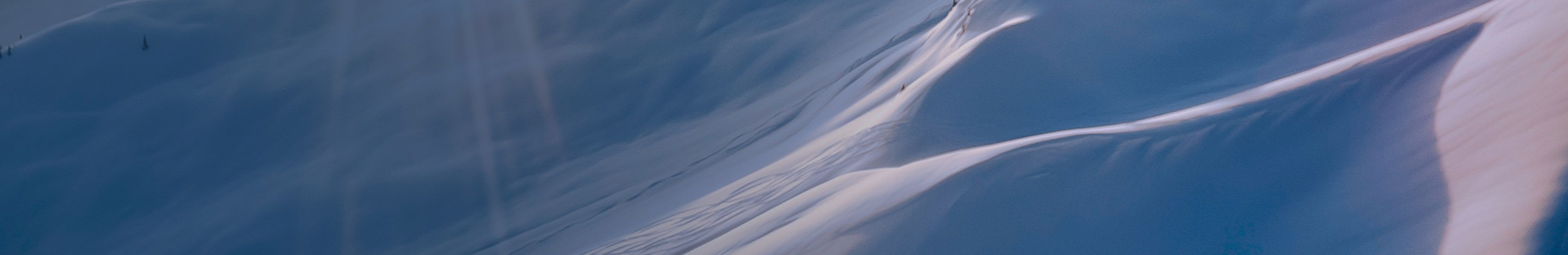 Light on snowy alpine ridges