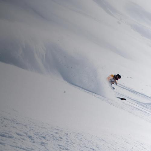 Skier in chest deep snow