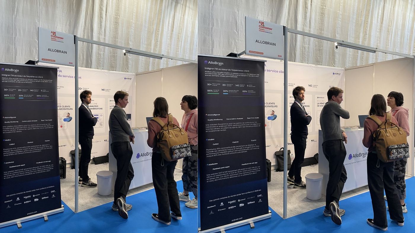 Aisles of exhibition stands and pull-up banners on the All4Customer show floor