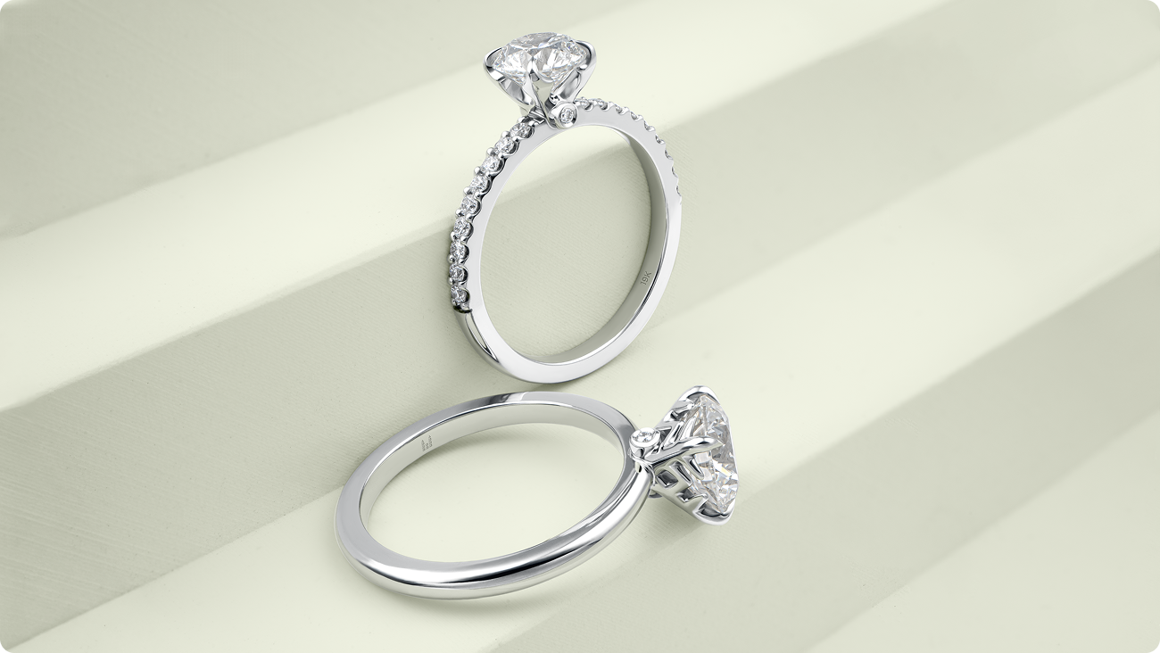 Side profile of a diamond engagement ring from the Nord-Ouest Collection by Château D’Ivoire, featuring a snowflake-inspired setting and pavé band over a technical jewelry design sketch.