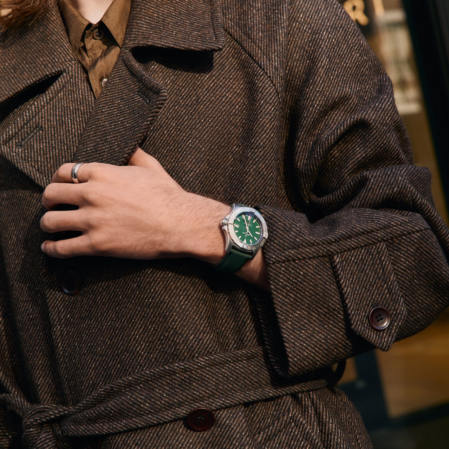 Luxury watches showcased in a festive holiday setting, highlighting elegant timepieces available at Château d’Ivoire.