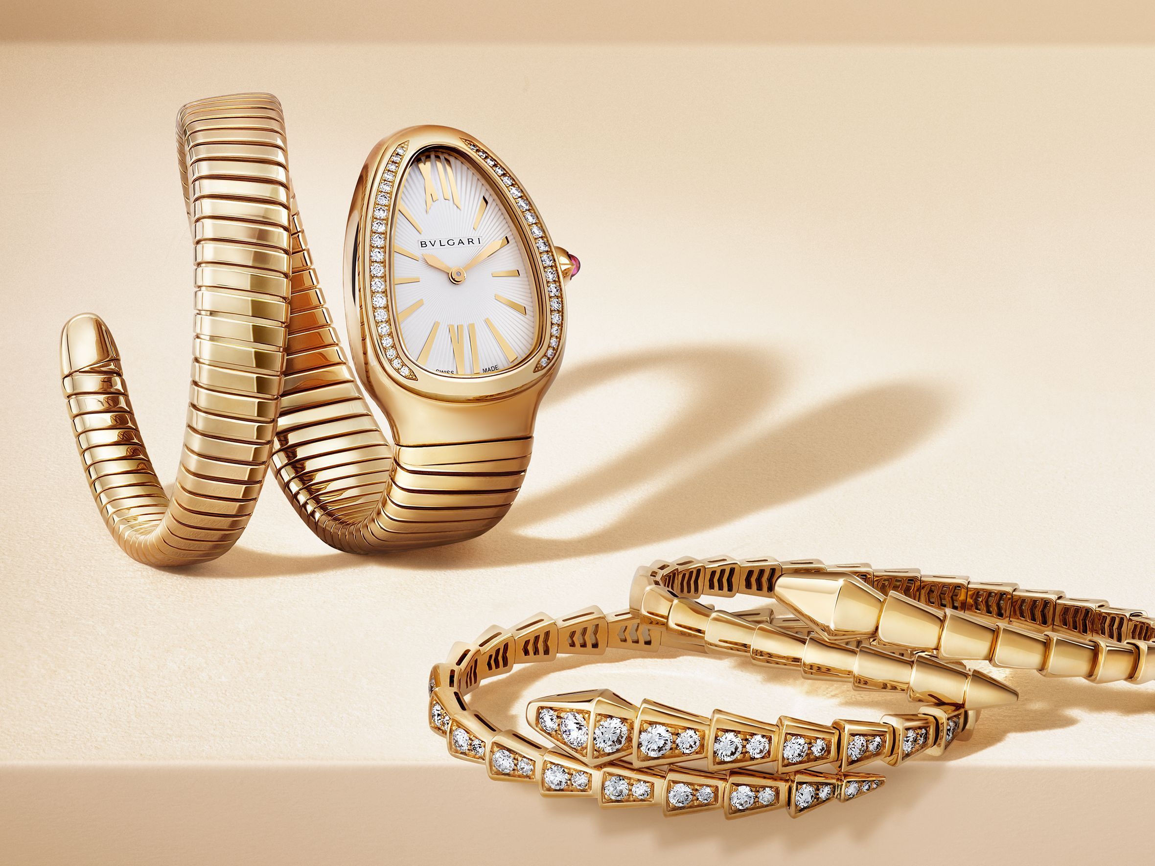 Bulgari Serpenti Tubogas watch and Serpenti Viper bracelets in yellow gold with diamonds.