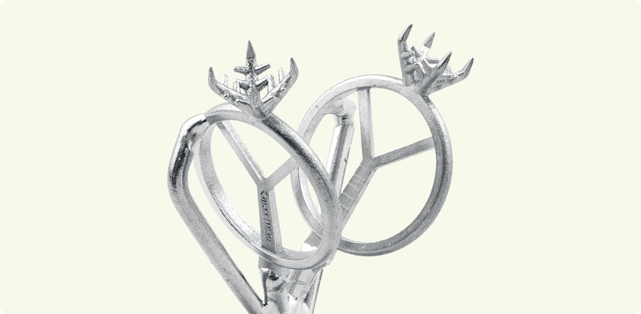 Side profile of a handcrafted diamond engagement ring from the Nord-Ouest collection by Château D’Ivoire, featuring a snowflake-inspired basket setting and pavé band against a technical jewelry design sketch.