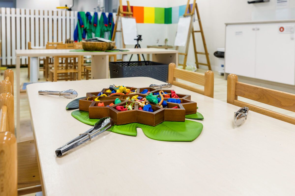 A table set up with childrens toys