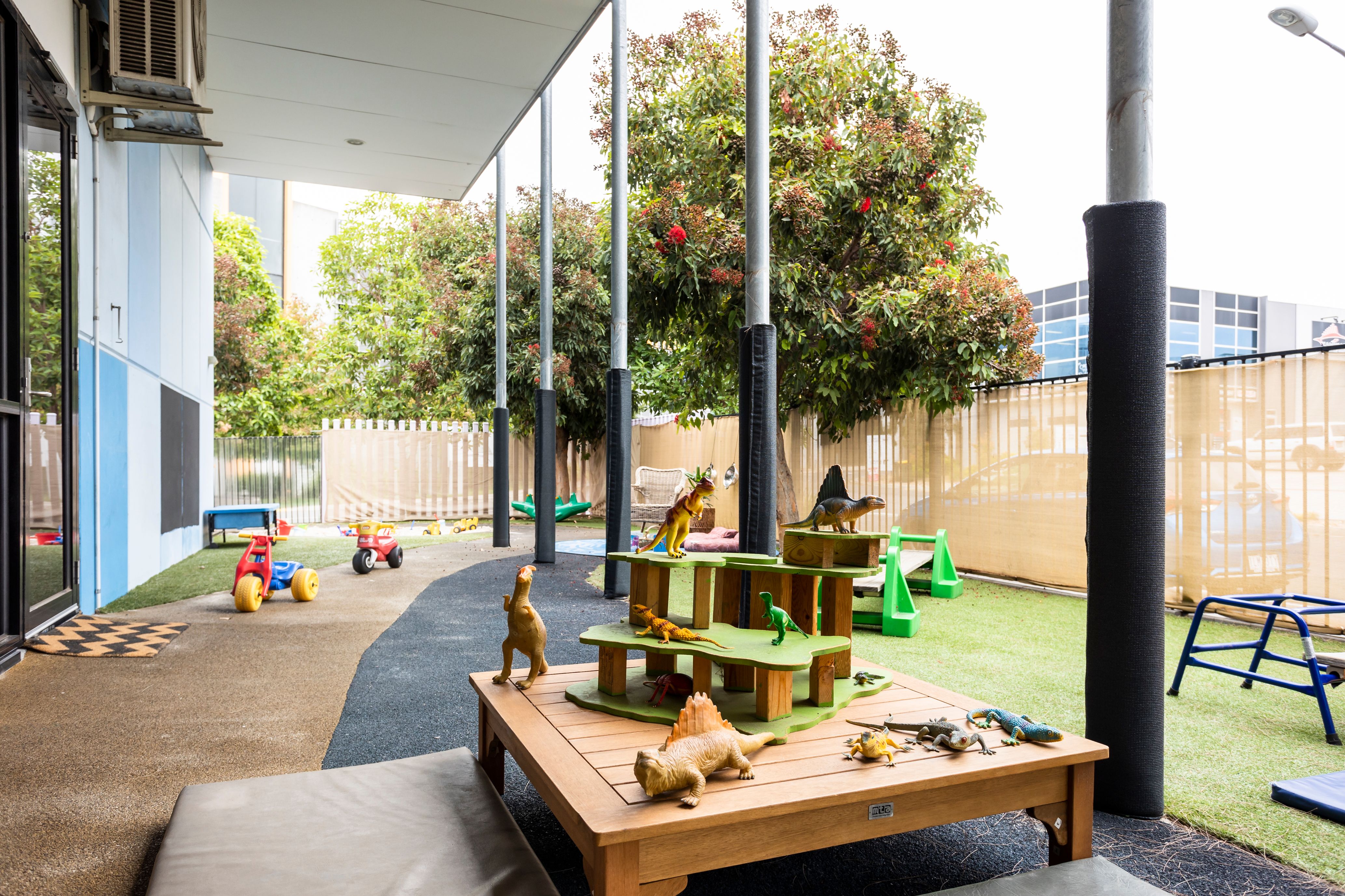 An outdoor table with toys 