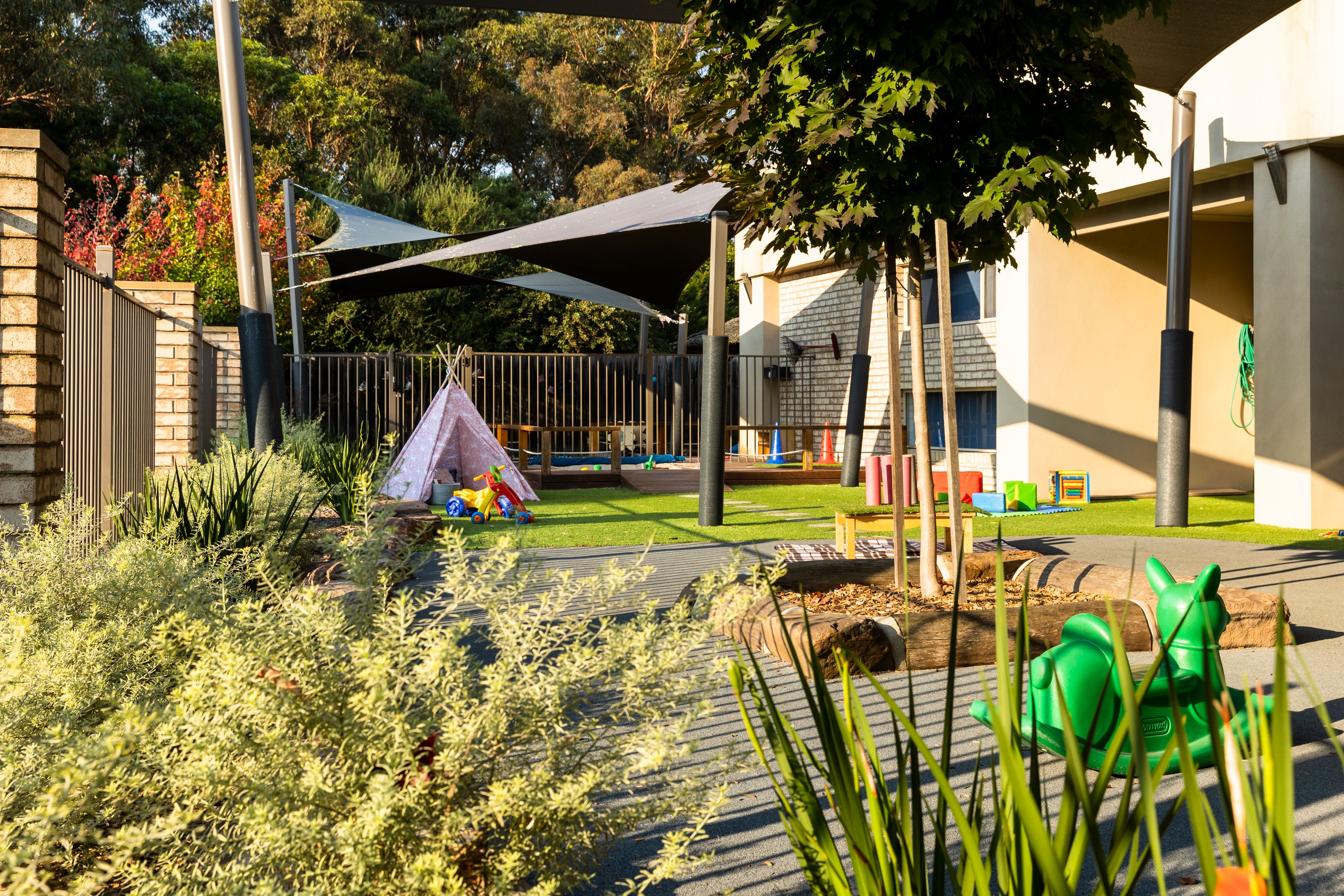 A large open playground with sandpits