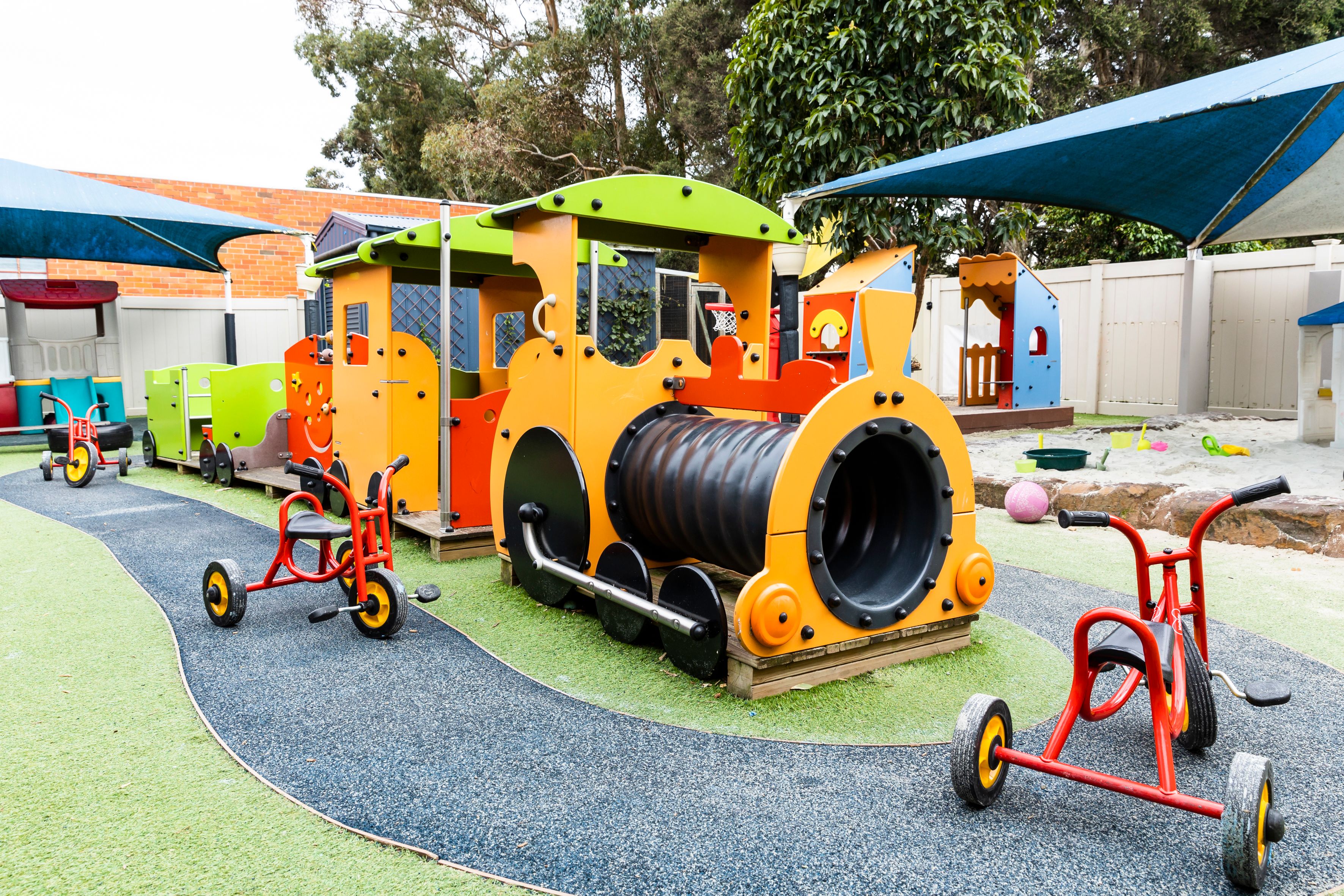A large open playground with sandpits