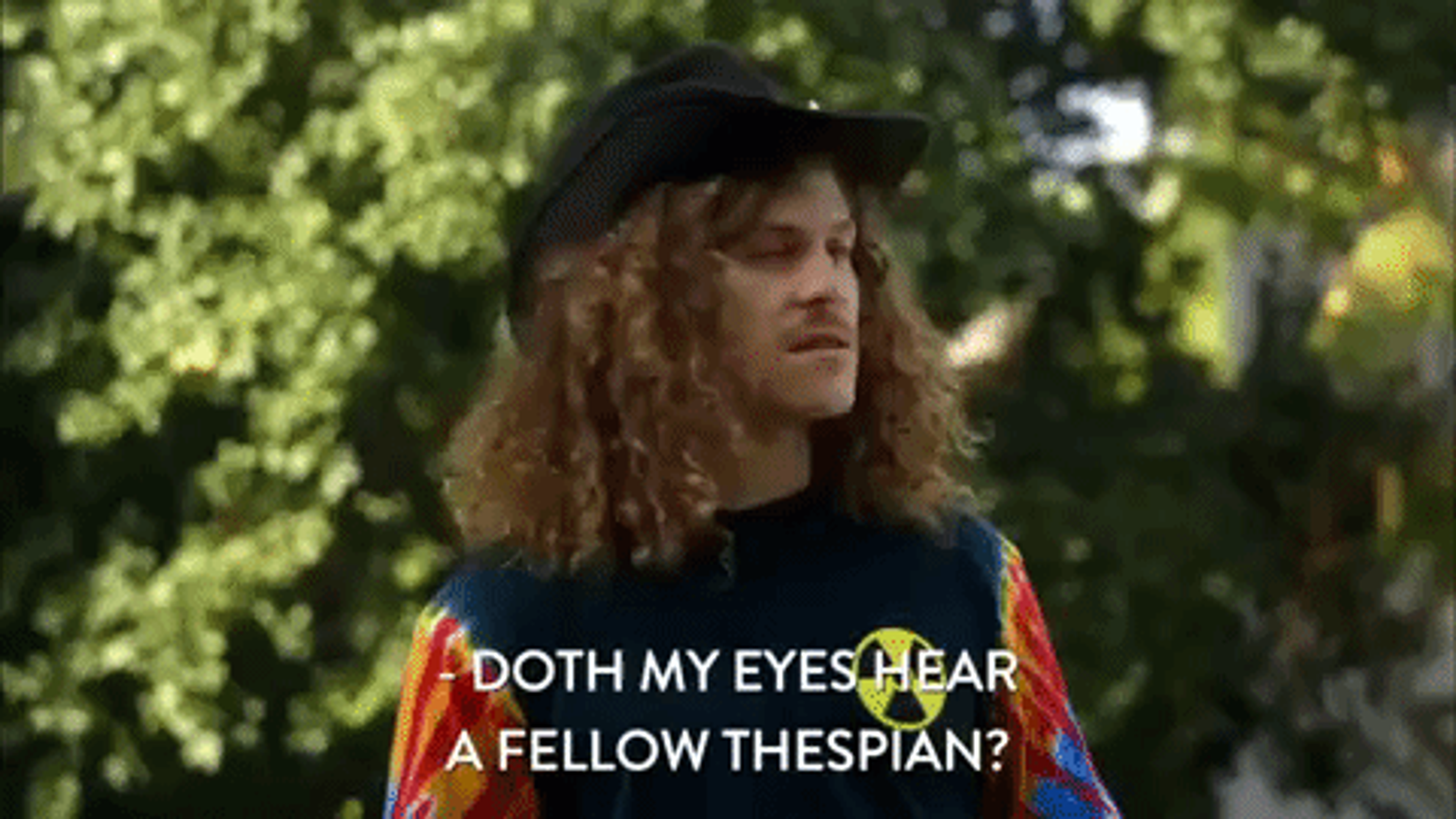 An image from a movie with a man in renaissance clothing. The text reads "Doth my eyes hear a fellow thespian?"