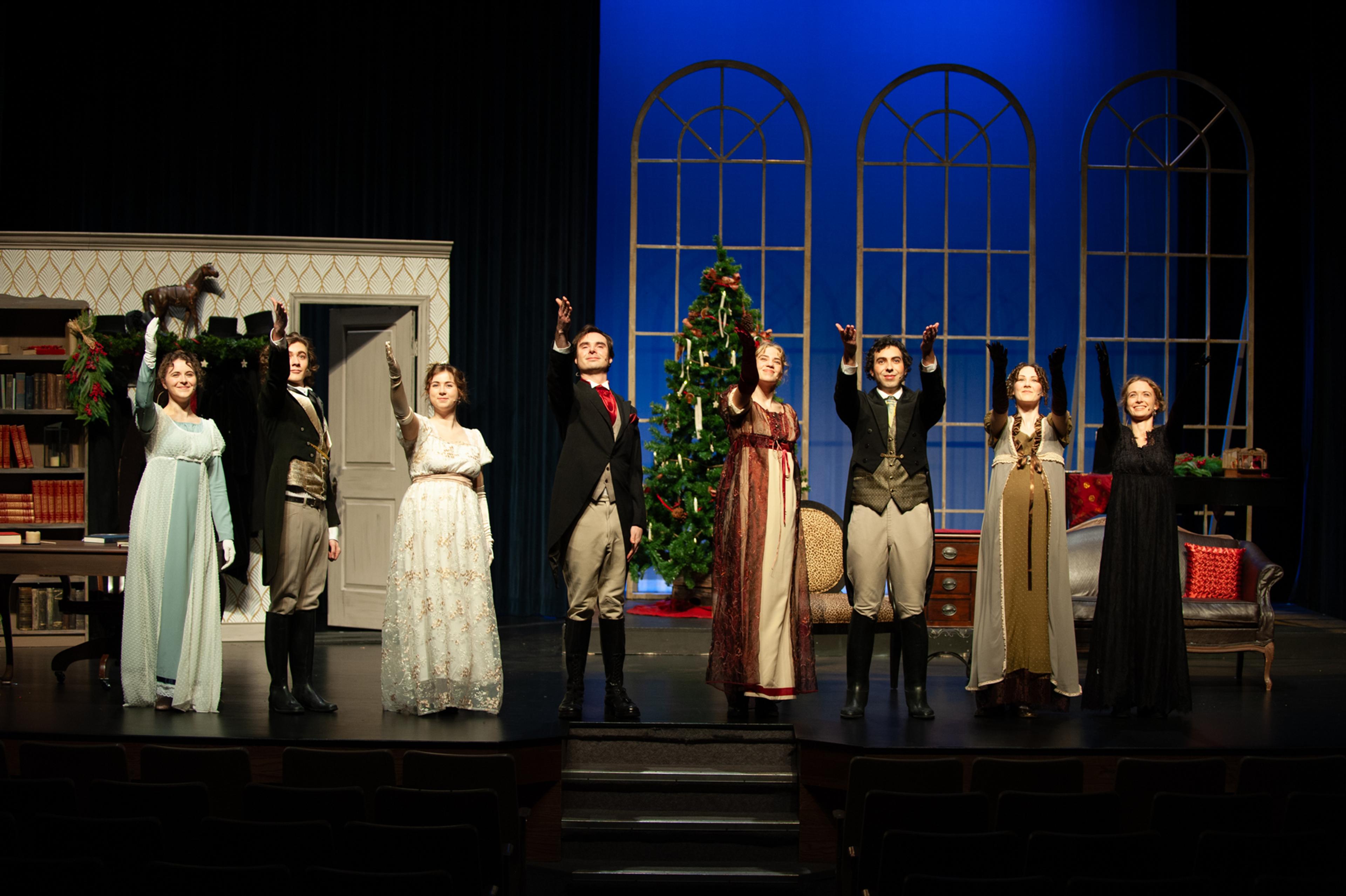 The cast of Miss Bennet: Christmas at Pemberley gesturing to the tech booth