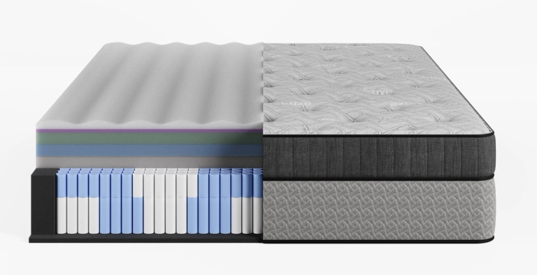Cutaway view of a mattress displaying internal foam and individually wrapped coil layers, next to its quilted exterior and matching box spring.