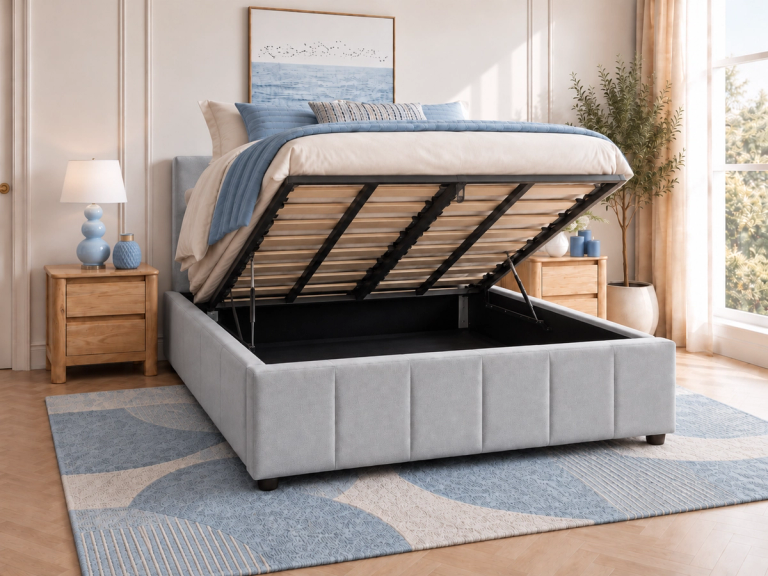 Light grey upholstered storage bed with mattress lifted, revealing the compartment.