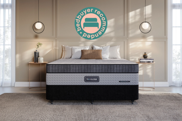 NeoLUXE mattress on a bed base in a bedroom with a "Bedbuyer Recommended" badge.
