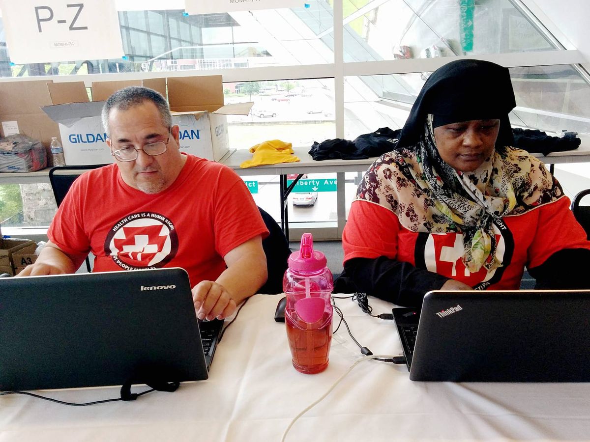 Bahjah and Kim help with check-in at Mission of Mercy 2016 in Pittsburgh.