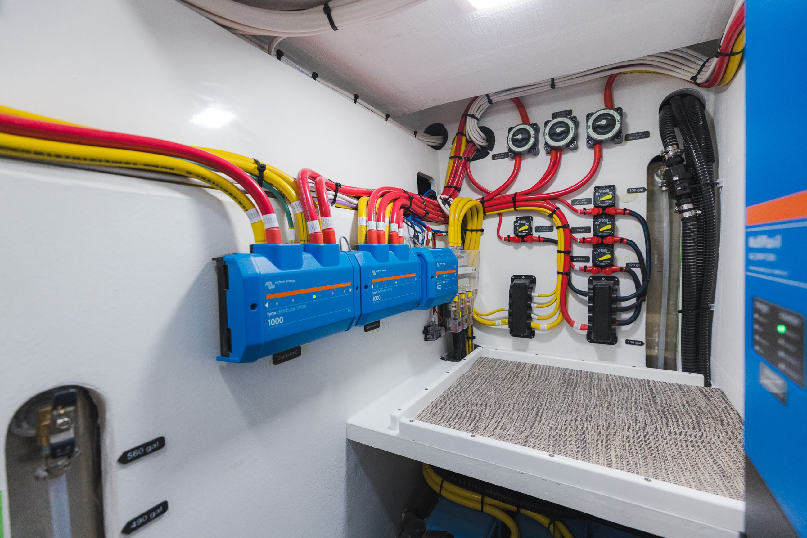 Stand-up utility room electronics aft of the mid-berth in the Lindell 48