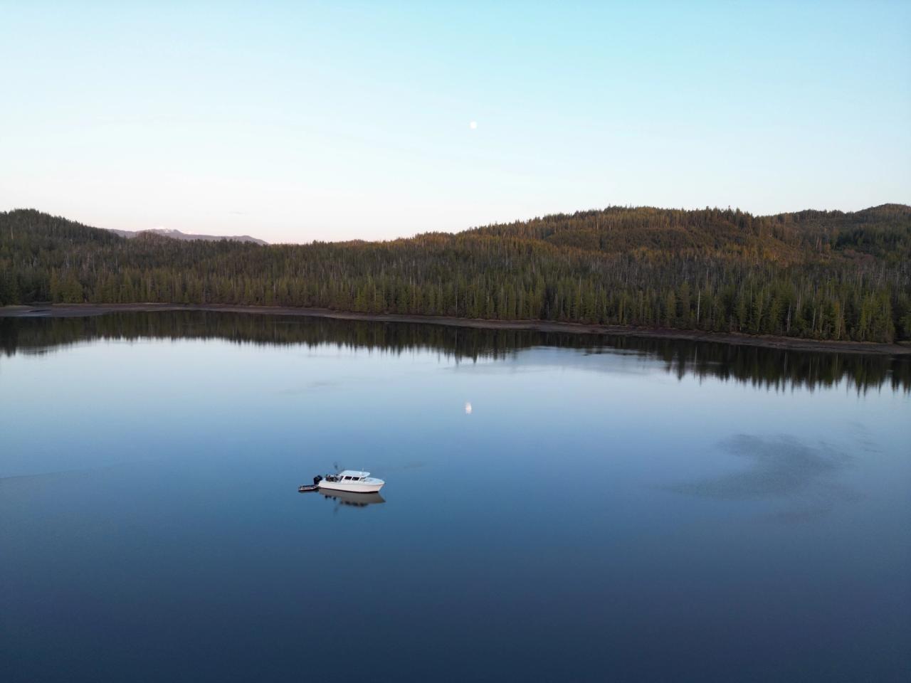 Lindell 41 anchored in a bay in Alaska at sunset