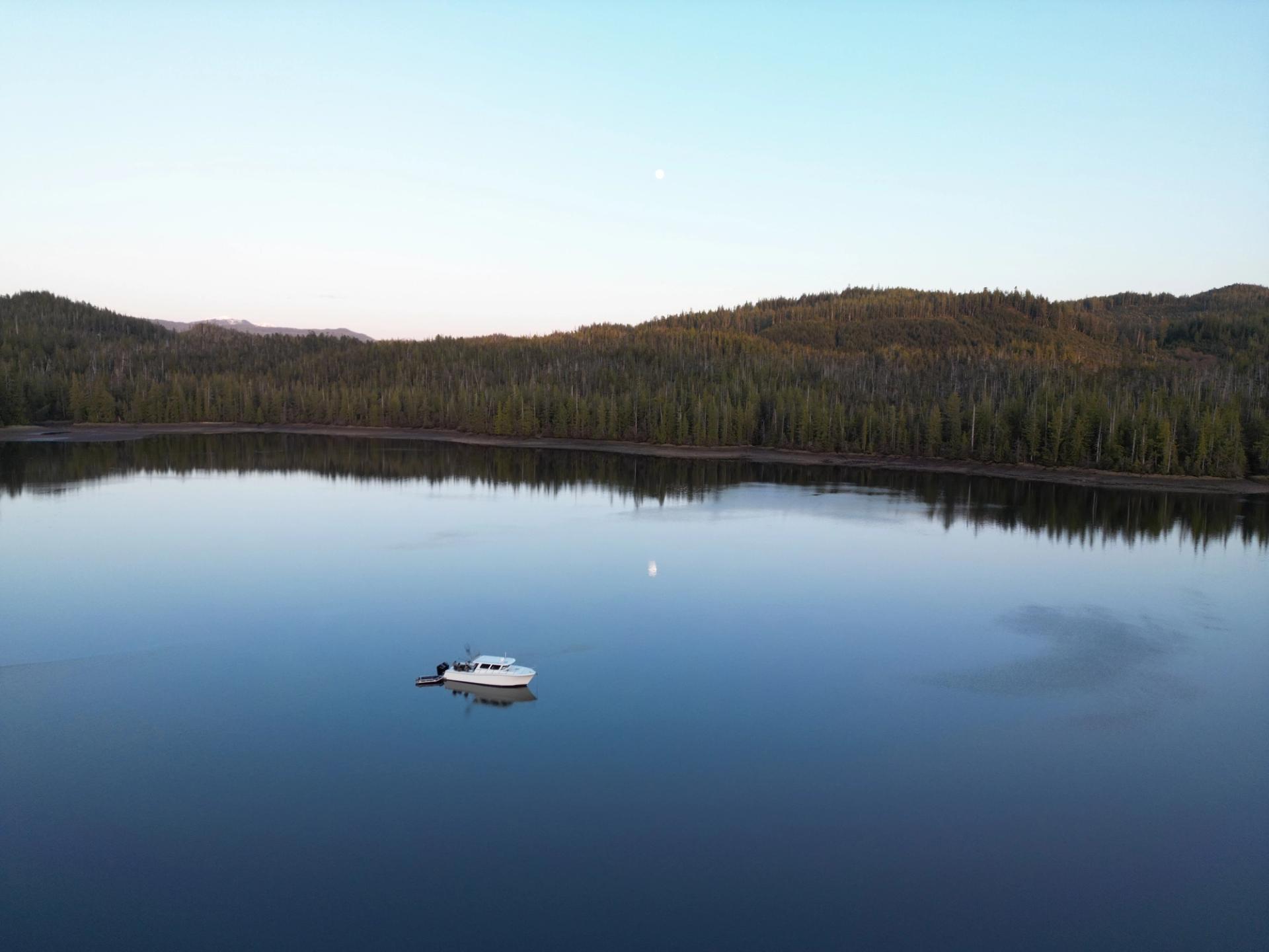 Lindell 41 anchored in a bay in Alaska at sunset
