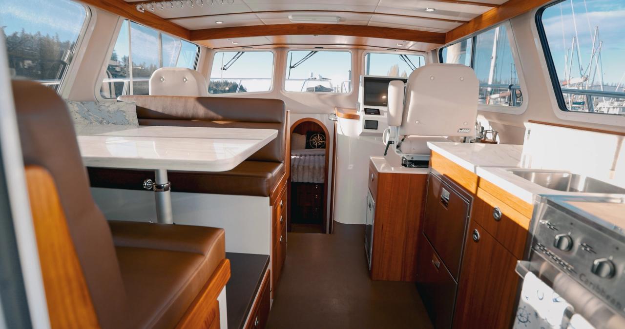 Lindell 42 pilothouse with helm, salon, galley visible