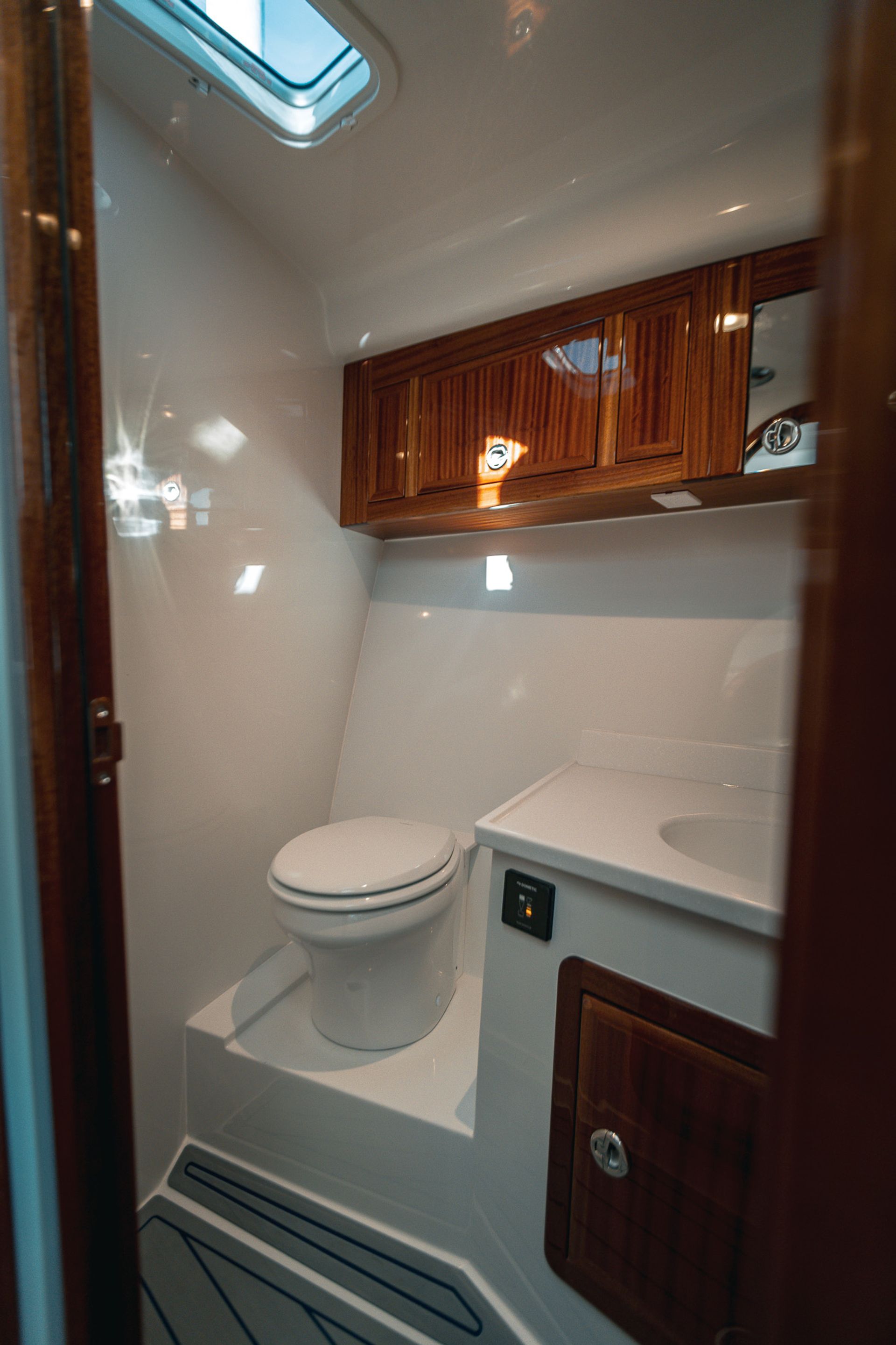 Starboard-side head in the Lindell 38 with light coming through hatch